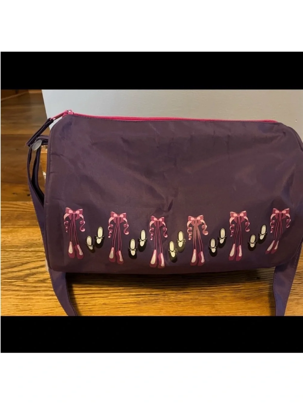 Purple ballet shoes dance bag.